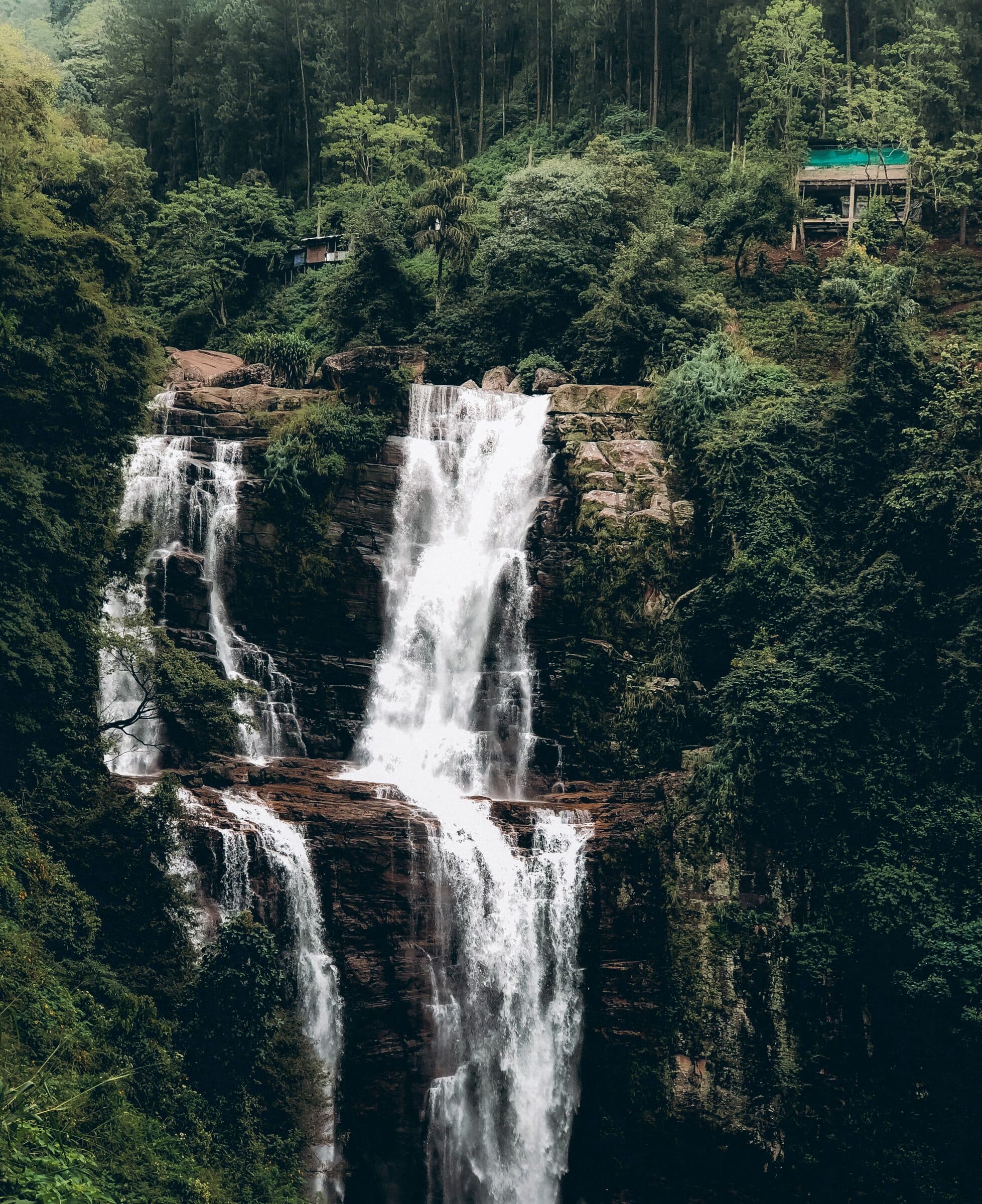 Waterfall cascading through Sri Lanka’s hill country